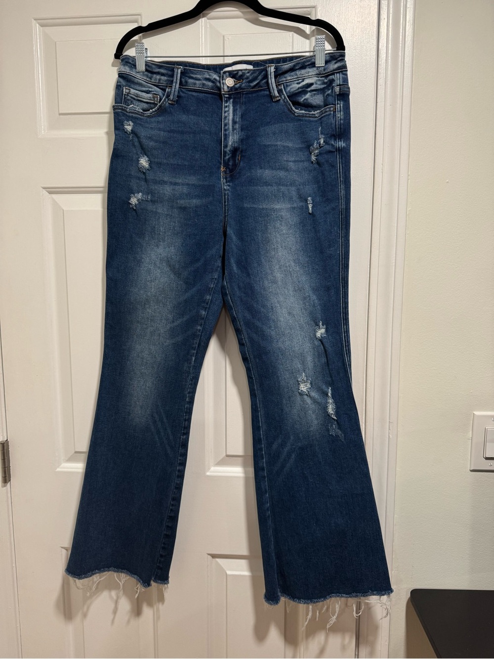 Vervet Mildly Distressed Raw Hem Bootcut Jeans